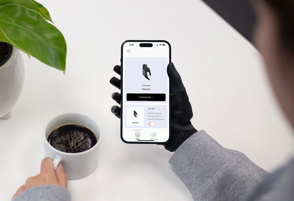 TASKA-user-having-a-coffee-while-using-MyTASKA-app_opt