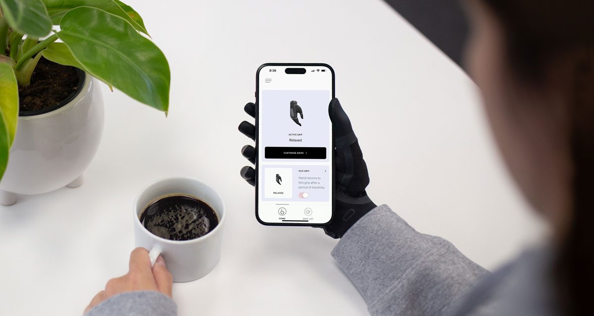 TASKA-user-having-a-coffee-while-using-MyTASKA-app_opt